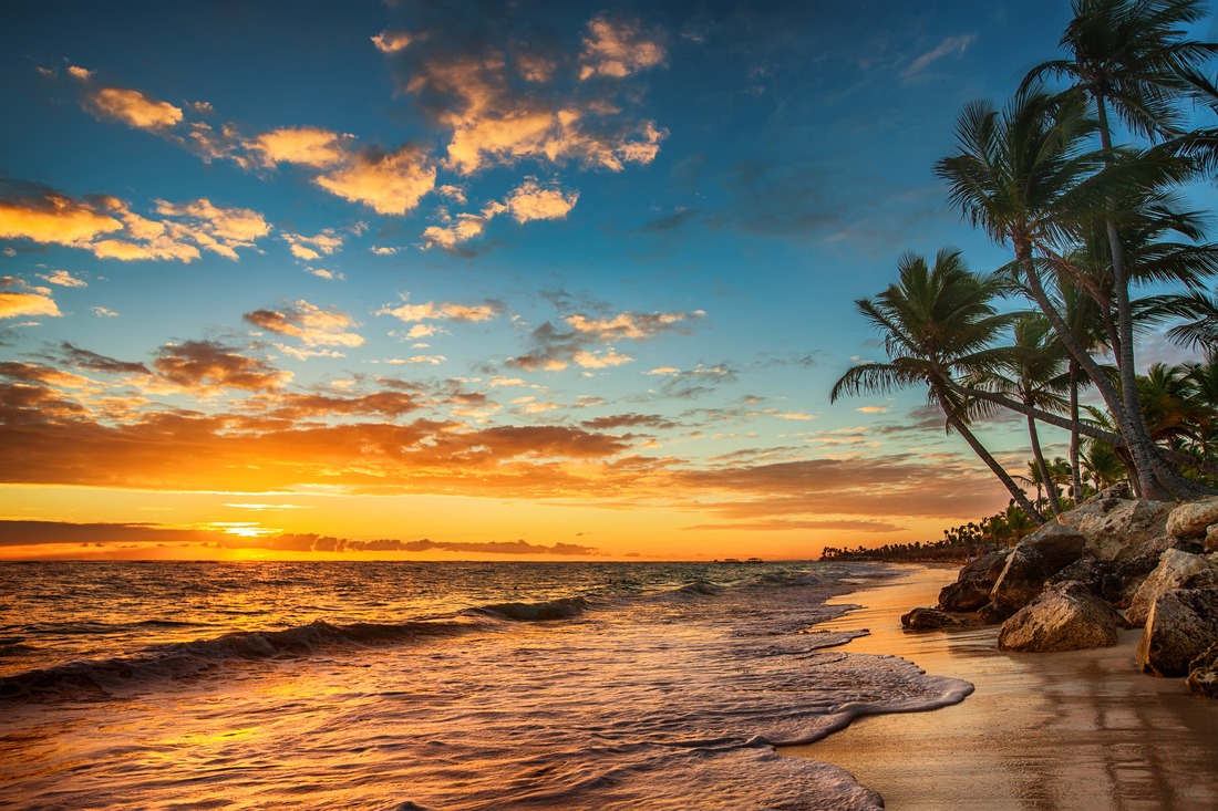 Tropical beach island at sunset